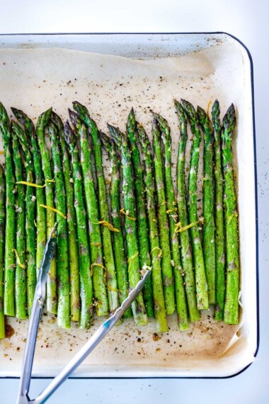 Simple Roasted Asparagus with olive oil, garlic, lemon zest, baked at 400F, in about 20 minutes. A fast, easy, healthy vegetable side dish that pairs with so many things!