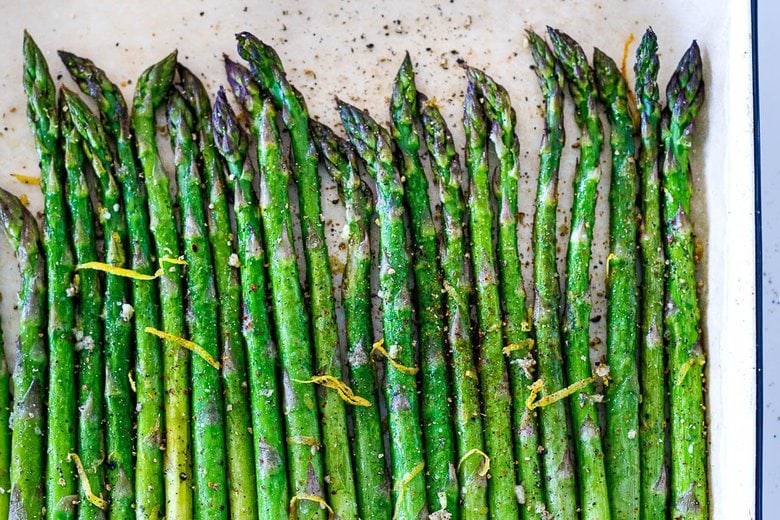 Simple Roasted Asparagus with olive oil, garlic, lemon zest, baked at 400F, in about 20 minutes. A fast, easy, healthy vegetable side dish that pairs with so many things!