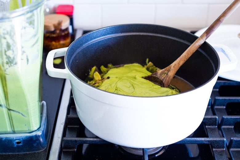 Add the creamy blended soup back into the pot