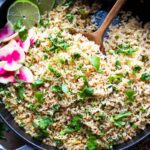An easy healthy recipe for Cilantro Lime Rice that is made on the stovetop. Make this with brown or white basmati rice ( or jasmine!). #rice #cilantrolimerice #mexicanrice