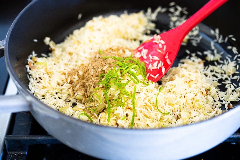 sauteening rice, zest and coriander 