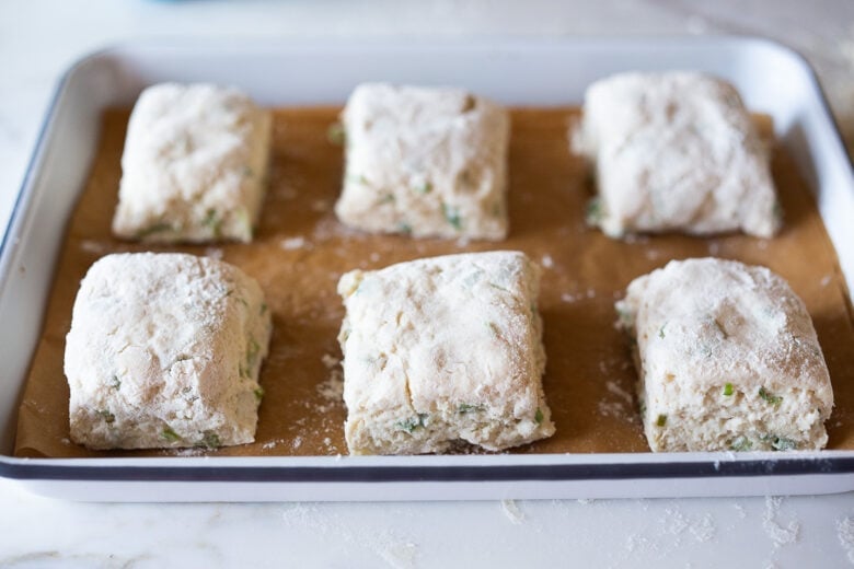 Sourdough biscuits on a tray ready to bake.