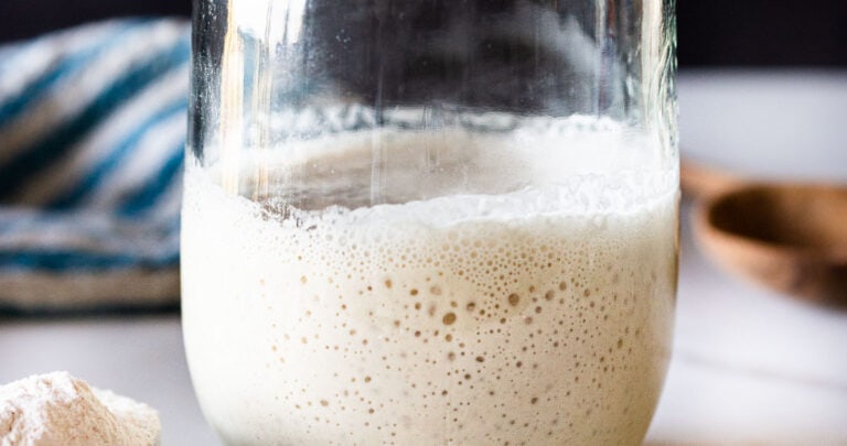 How to make your own Sourdough Starter, using simple ingredients with no special equipment, in 5-8 days, that can be used in crusty bread, pizza dough, waffles, pancakes, and rolls- instead of using yeast. Sourdough Starter is "wild" yeast, made from flour and water and the wild yeast in the air around us. 