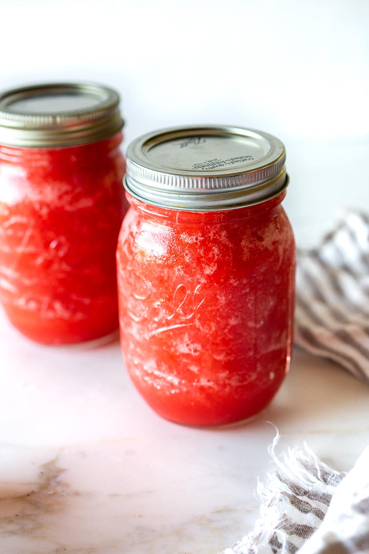 Say hello to the best Strawberry Margaritas made with  fresh, ripe, juicy strawberries! These "frozen" Strawberry Margaritas are light and refreshing and go down a little too easily! Naturally sweetened, nicely balanced with the best flavor! 