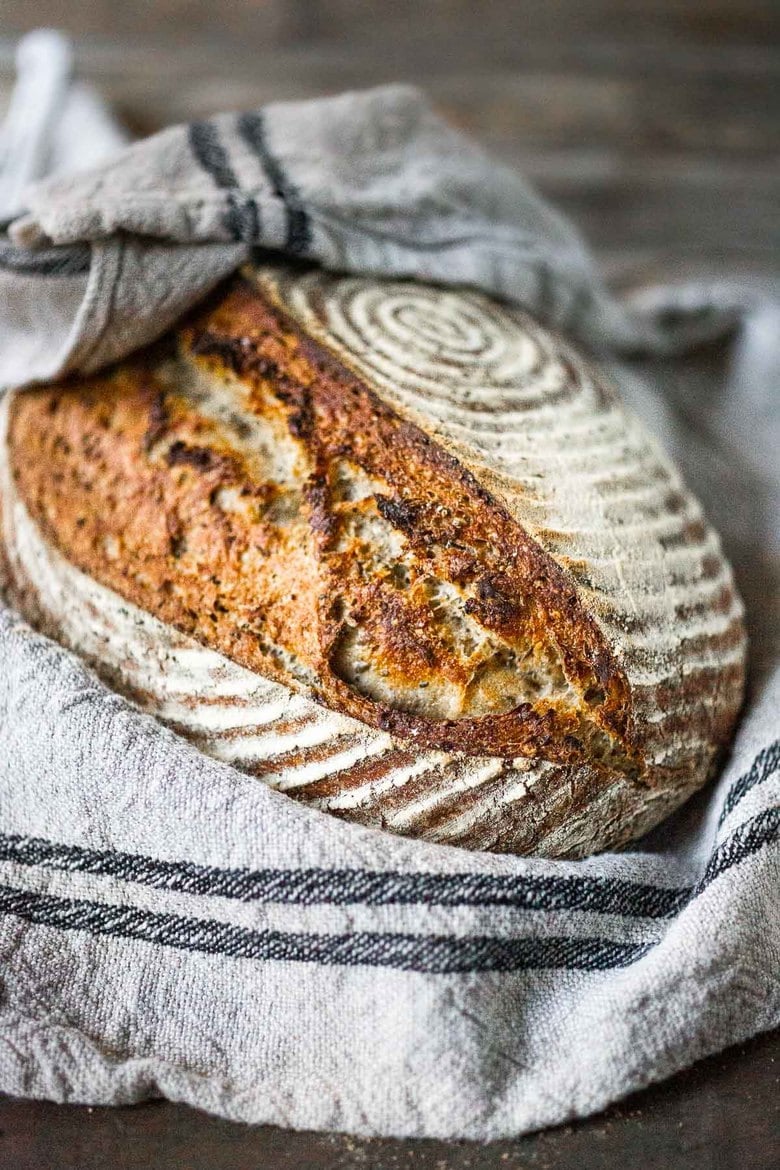 A loaf of sourdough bread. A step-by-step guide to making the best Sourdough Bread!