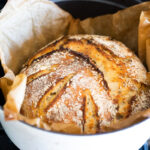 An EASY recipe for No Knead Sourdough Bread that rises overnight and is baked in the morning. #sourdough