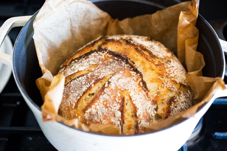 An EASY recipe for No Knead Sourdough Bread that rises overnight and is baked in the morning. 