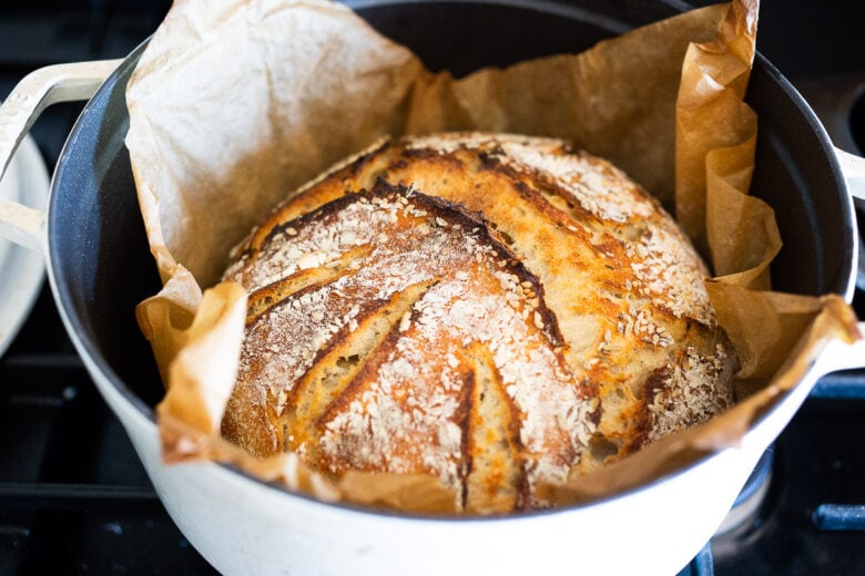 An EASY recipe for No Knead Sourdough Bread that rises overnight and is baked in the morning.