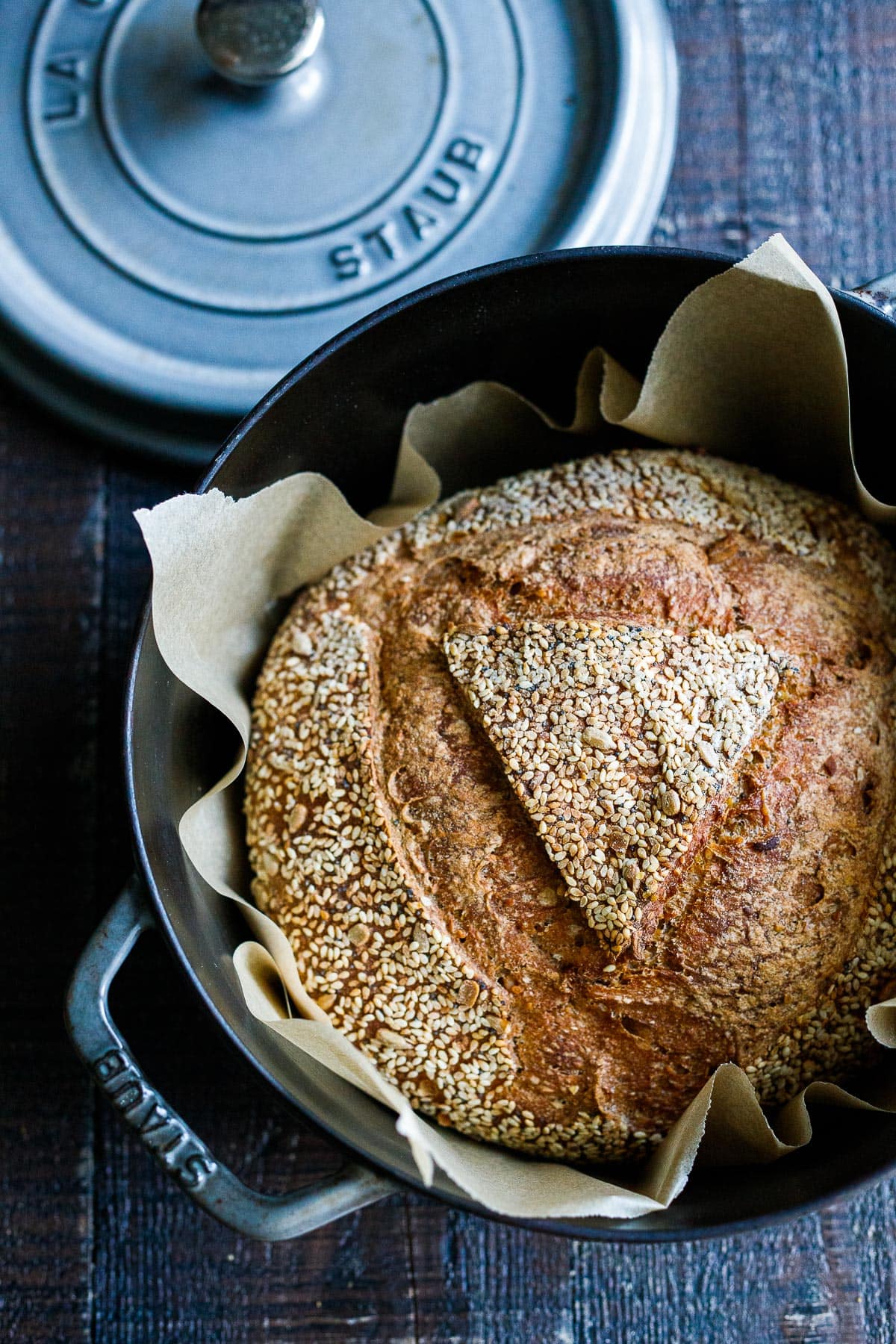 Baked sourdough bread in a Dutch oven.