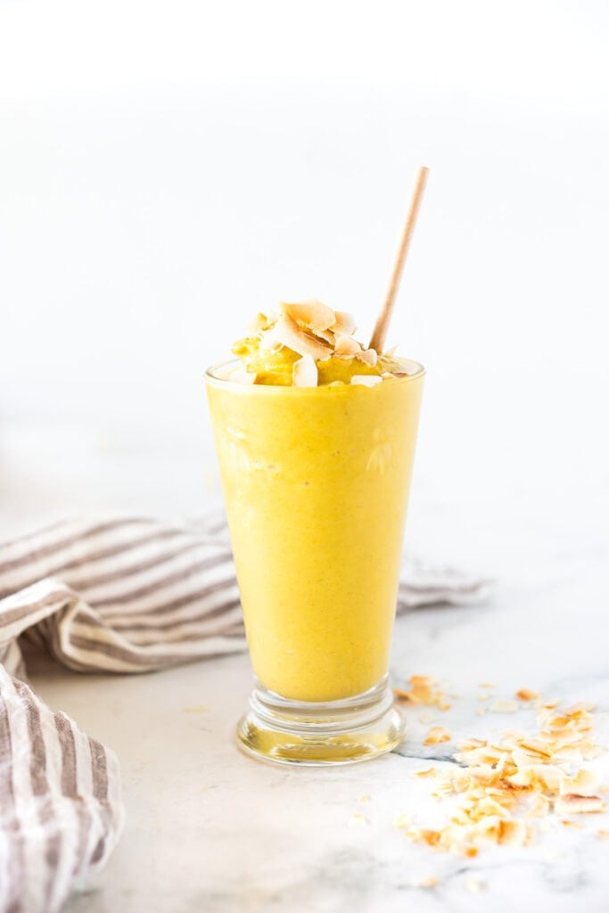 This Toasted Coconut Smoothie is like happy pillows of sunshine. Healthy, vegan, and delicious, the toasted coconut is the real star here- a beautiful beginning to your day.