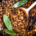 How to cook flavorful healthy vegan Mexican Pinto Beans using dry beans! A Simple easy recipe that can be made on the stovetop or in an Instant Pot. A delicious addition to your Mexican Feast, or weekly meal prep. It can be made ahead!  Allow 6 hours of soaking time.  #pintobeans