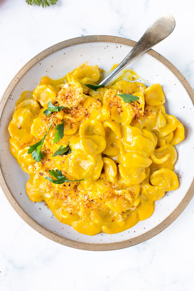 A simple delicious vegan recipe for Orecchiette Pasta with Creamy Carrot Miso Sauce, topped with  Carrot Top Gremolata (optional) and Toasted Bread Crumbs. Flavorful and healthy! #orecchiette 