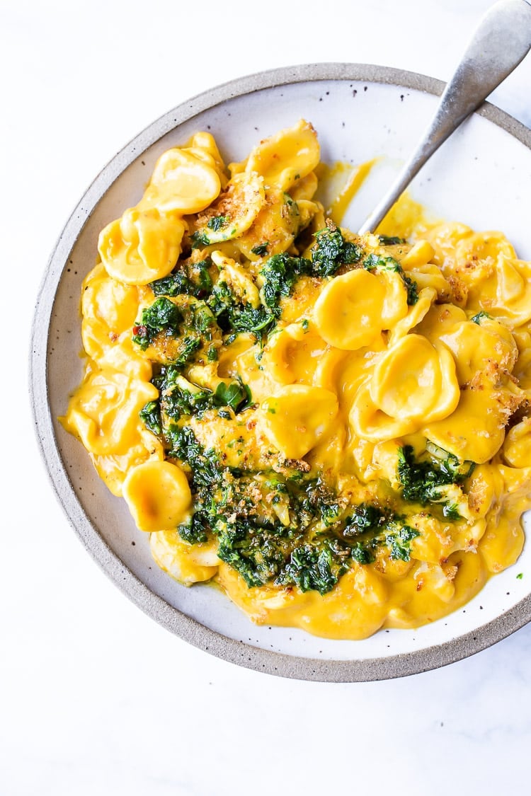  A simple delicious vegan recipe for Orecchiette Pasta with Creamy Carrot Miso Sauce, topped with  Carrot Top Gremolata (optional) and Toasted Bread Crumbs. Flavorful and healthy! #orecchiette 