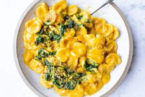  A simple delicious vegan recipe for Orecchiette Pasta with Creamy Carrot Miso Sauce, topped with  Carrot Top Gremolata (optional) and Toasted Bread Crumbs. Flavorful and healthy! #orecchiette