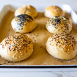 How to make Sourdough Buns with leftover over sourdough starter that are light and airy (like a brioche bun) in about 2 1/2 hours from start to finish, with only 20 minutes of hands-on time.