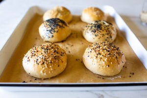 How to make Sourdough Buns with leftover over sourdough starter that are light and airy (like a brioche bun)  in about 2 1/2 hours from start to finish, with only 20 minutes of hands-on time. 