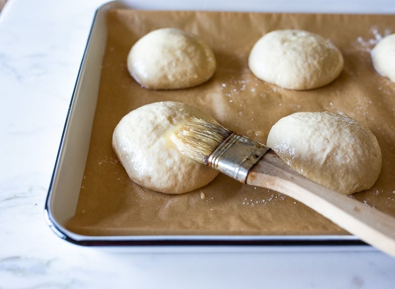 How to make Sourdough Buns with leftover over sourdough starter that are light and airy (like a brioche bun)  in about 2 1/2 hours from start to finish, with only 20 minutes of hands-on time. 