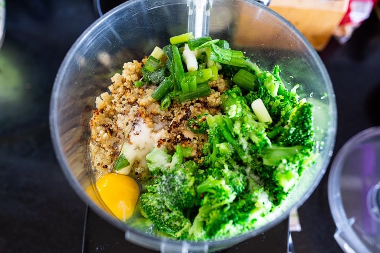 ingredients for broccoli cakes in food processor.