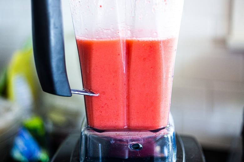 An easy recipe for fresh Strawberry Margaritas using ripe, juicy, in season strawberries! These blended Strawberry Margaritas are light and refreshing and go down a little too easy! Naturally sweetened, nicely balanced with the best flavor!