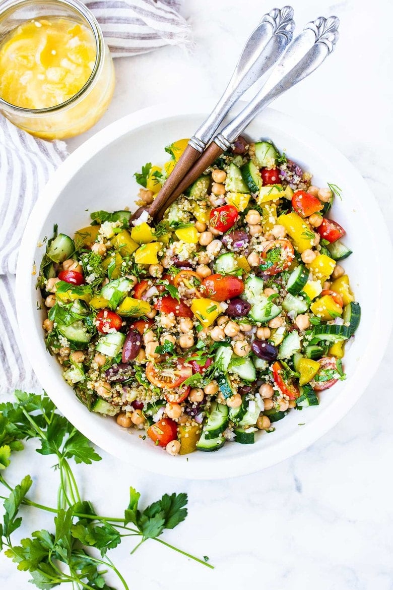 Say hello to your new favorite Quinoa Salad! Not only will you love how easy this Quinoa Salad is to make, I know you will fall head over heels in love with the Mediterranean flavors. Quinoa is combined with chickpeas, cucumber, tomatoes, kalamata olives, red onion, fresh dill and loads of parsley, but it's this incredible dressing that elevates; Preserved Lemon Dressing!