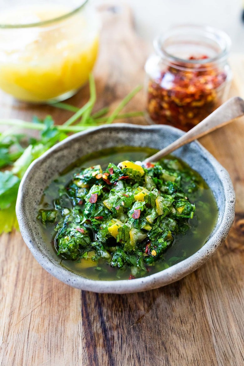 A simple recipe for Preserved Lemon Gremolata, an hearty zesty vegan condiment you'll want to put on everything! Delicious on grilled meats and fish, tossed with lentils, beans or pasta, or used as a dressing! #preservedlemon