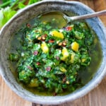 A simple recipe for Preserved Lemon Gremolata, an herby zesty vegan condiment you'll want to put on everything! Delicious on grilled meats and fish, tossed with lentils, beans or pasta, or used as a dressing!