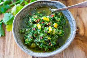 A simple recipe for Preserved Lemon Gremolata, an herby zesty vegan condiment you'll want to put on everything! Delicious on grilled meats and fish, tossed with lentils, beans or pasta, or used as a dressing!