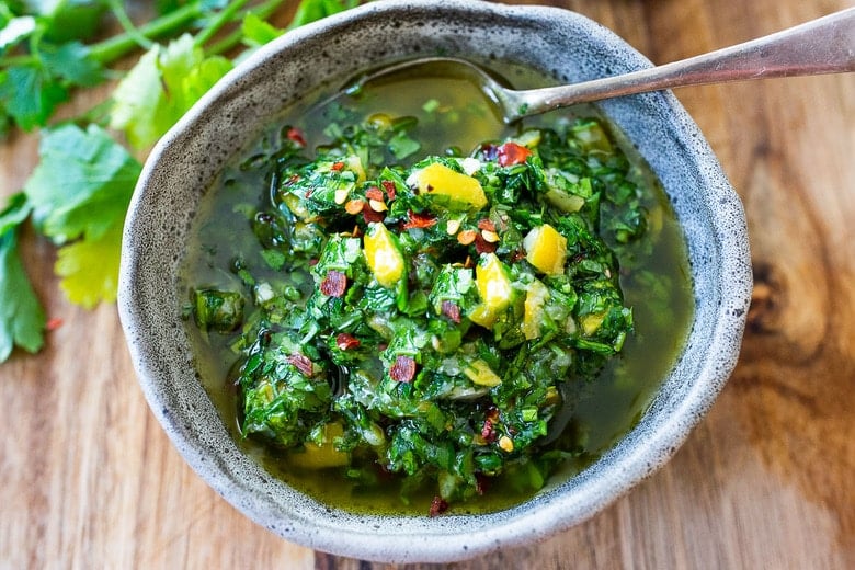 A delicious use for Preserved Lemons, this herby, zesty Preserved Lemon Gremolata w/ parsley, olive oil  & garlic is tasty over grilled fish, or meat or grilled veggies, or tossed with beans or pasta!  Fresh and flavorful! 