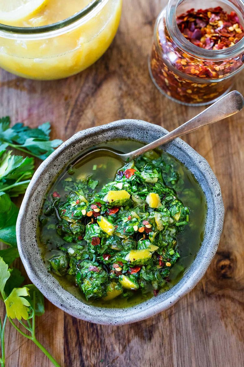 A delicious use for Preserved Lemons, this herby, zesty Preserved Lemon Gremolata w/ parsley, olive oil  & garlic is tasty over grilled fish, or meat or grilled veggies, or tossed with beans or pasta!  Fresh and flavorful! 