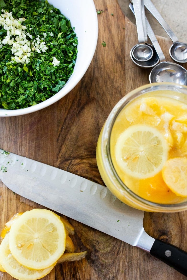 A simple recipe for Preserved Lemon Gremolata, an hearty zesty vegan condiment you'll want to put on everything! Delicious on grilled meats and fish, tossed with lentils, beans or pasta, or used as a dressing! #preservedlemon