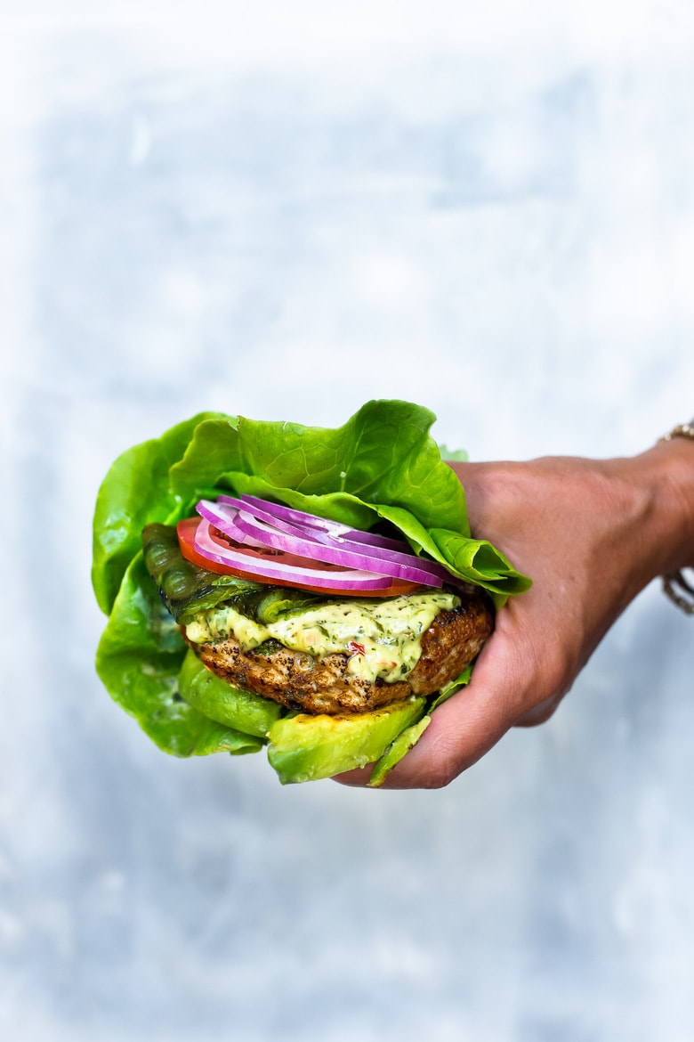 The best Turkey Burger Recipe with jalapeño, cilantro, lime zest, scallions , roasted poblano peppers and Chimichurri Mayo! Serve it in a bun or in a lettuce wrap! #turkeyburger #turkeyburgerrecipe