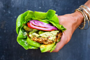 The best Turkey Burger Recipe with jalapeño, cilantro, lime zest, scallions , roasted poblano peppers and Chimichurri Mayo! Serve it in a bun or in a lettuce wrap! #turkeyburger #turkeyburgerrecipe