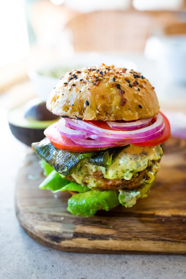 The best Turkey Burger Recipe with jalapeño, cilantro, lime zest, scallions , roasted poblano peppers and Chimichurri Mayo! Serve it in a bun or in a lettuce wrap! #turkeyburger #turkeyburgerrecipe