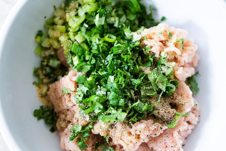 How to make turkey burgers- mixing in a bowl