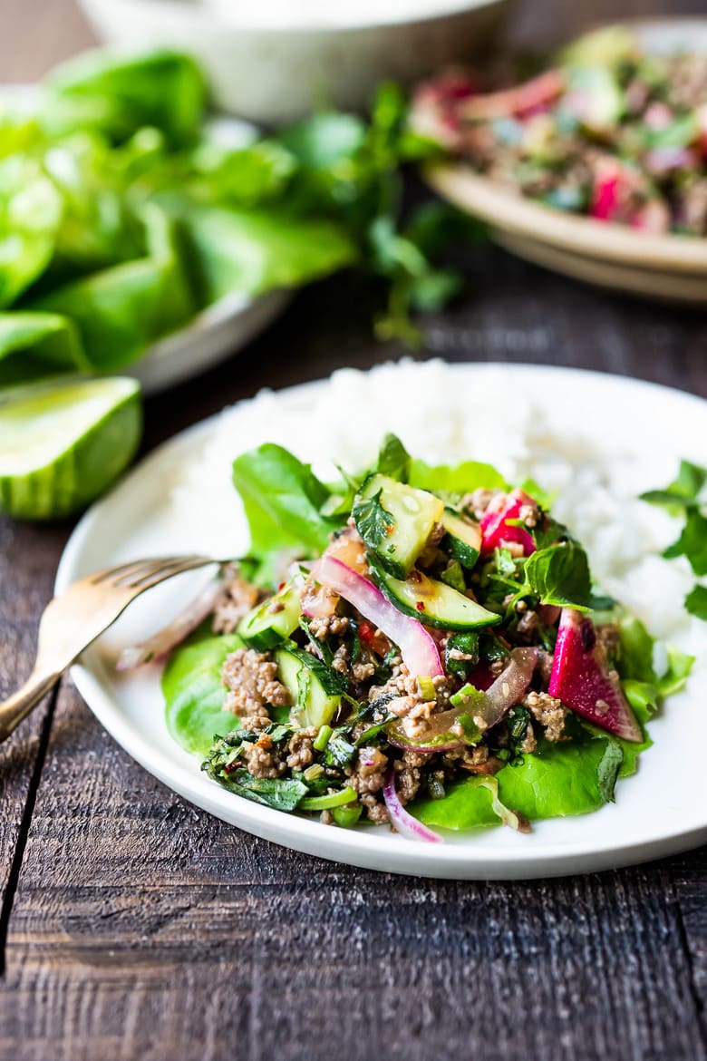 A flavorful recipe for Larb, a fresh Thai salad made with your choice of lamb, beef, pork, chicken or tofu. Low carb, fast and easy! #larb #thaifood #thaisalad