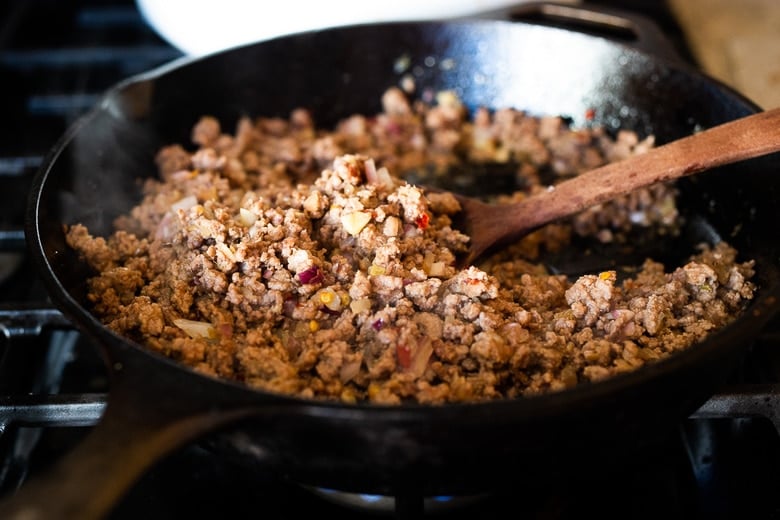 add ground chicken, turkey, beef or lamb to the pan.