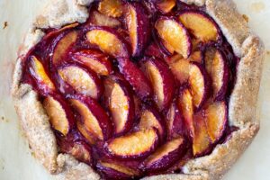 A simple recipe for Plum Galette with Buckwheat Crust with a hint of cardamon. A light and delicious summer dessert.