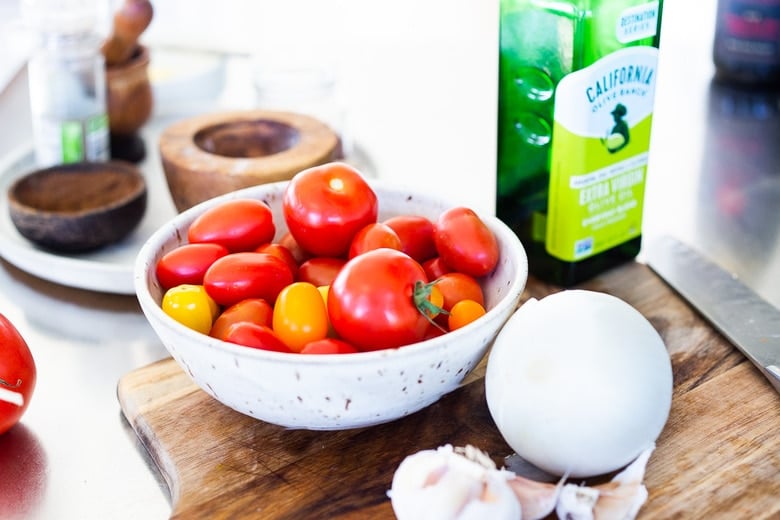 A summery Tomato Risotto made with juicy, sweet, vine-ripened tomatoes, and infused with saffron.  Serve this as a vegetarian main, seasonal side dish, or top it off with smoky,  pan-seared shrimp. Vegetarian-adaptable!