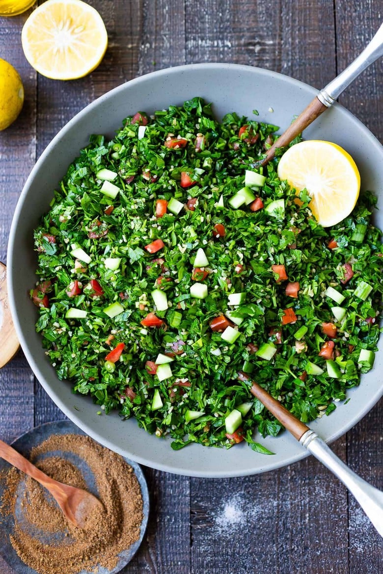 How to make the BEST Tabouli - this authentic Lebanese version is full of flavor, vegan and can be made with bulgar or quinoa. Seasoned with 7- spice! #tabouli #tabbouleh 