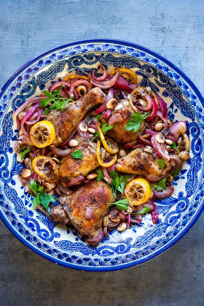 Lebanese Chicken with 7-Spice, caramelized onions, almonds and roasted lemon. A simple flavorful Lebanese-inspired dinner, with only 15 minutes of hands on time. Roast or Grill! 