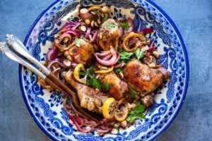 Roasted Lebanese 7-Spice Chicken with caramelized onions, almonds and roasted lemon. A simple flavorful Lebanese-inspired dinner, with only 15 minutes of hands on time. #chicken #lebanesechicken #lebanesefood #7spice