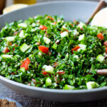 How to make the BEST Tabouli - this authentic Lebanese version is full of flavor, vegan and can be made with bulgar or quinoa. Seasoned with 7- spice! #tabouli #tabbouleh