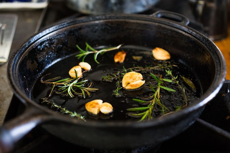 infuse the oil with garlic and herbs