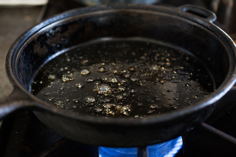 how to make smashed potatoes- heat oil in a skillet