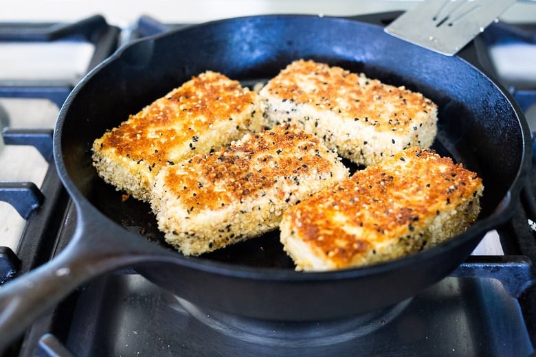 Tofu Katsu cooking in a pan 