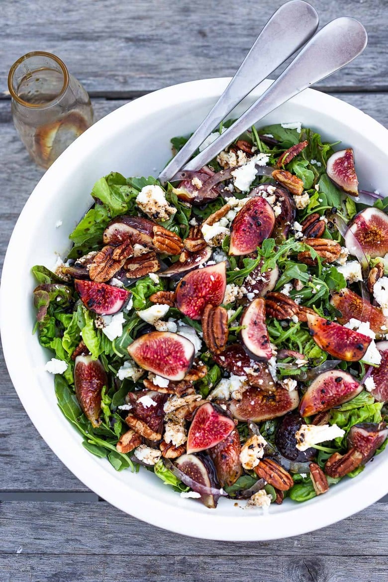 Here's one of our all-time favorite summer salads- Fig and Arugula Salad with Goat Cheese, Pecans and Basil tossed in a simple Balsamic Vinaigrette. #figsalad #figarugulasalad 