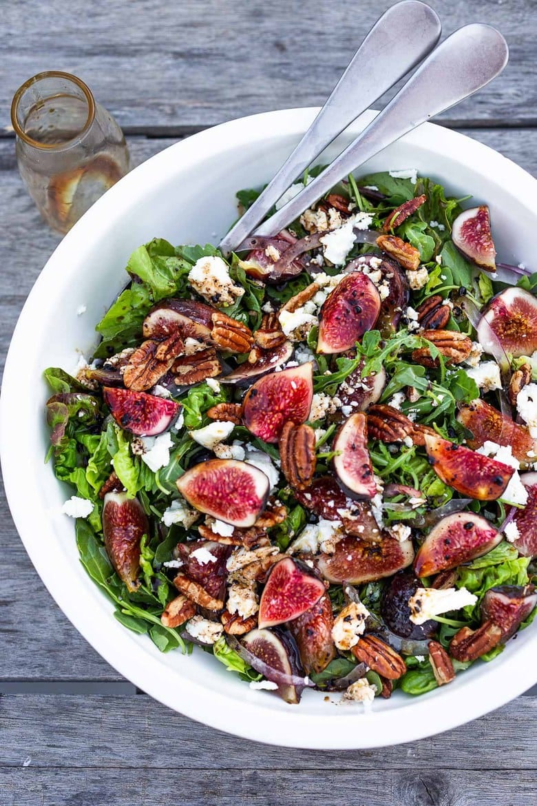 Here's one of our all-time favorite summer salads- Fig and Arugula Salad with Goat Cheese, Pecans and Basil tossed in a simple Balsamic Vinaigrette. #figsalad #figarugulasalad