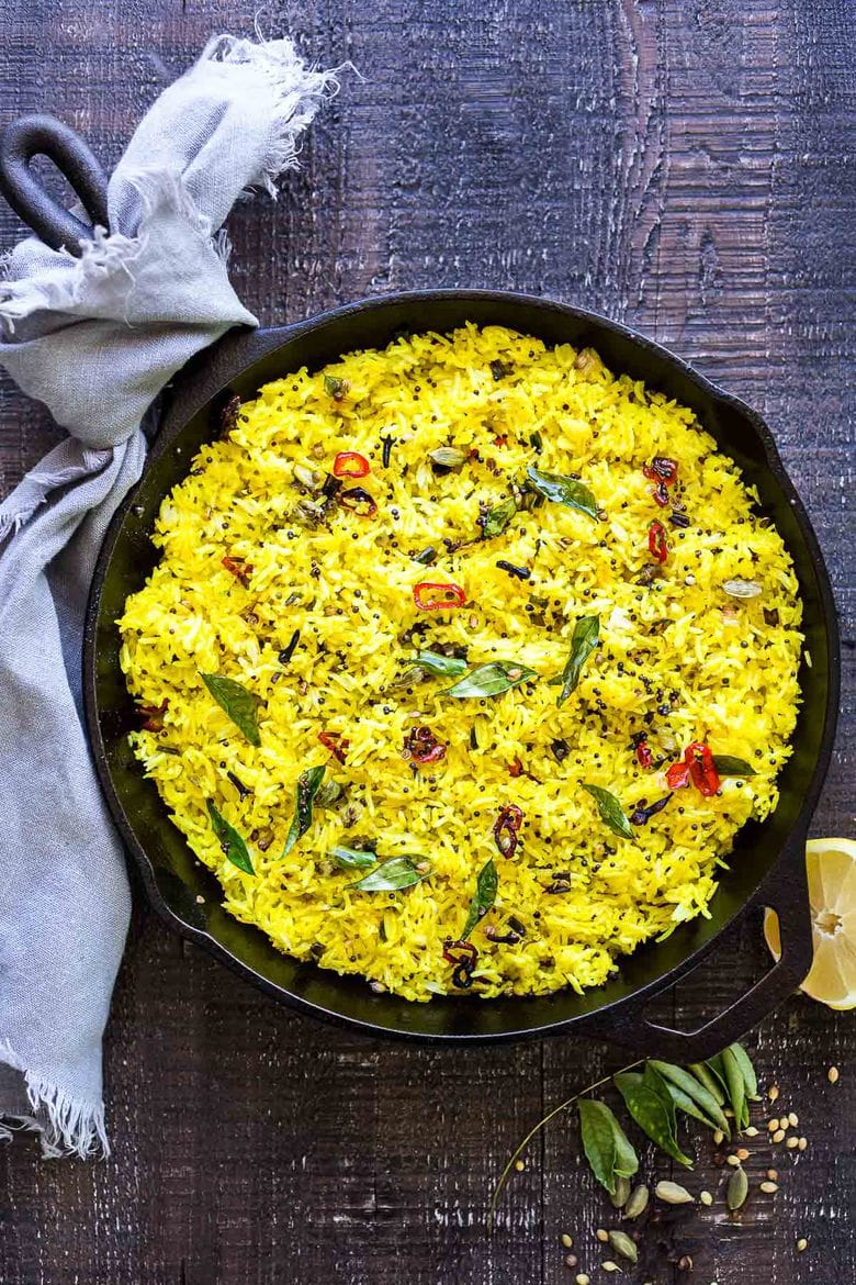 How to make Indian Lemon rice. Infused with Indian spices, this fragrant rice dish is the perfect side to your Indian meals. #lemonrice #indianrice #basmatirice 