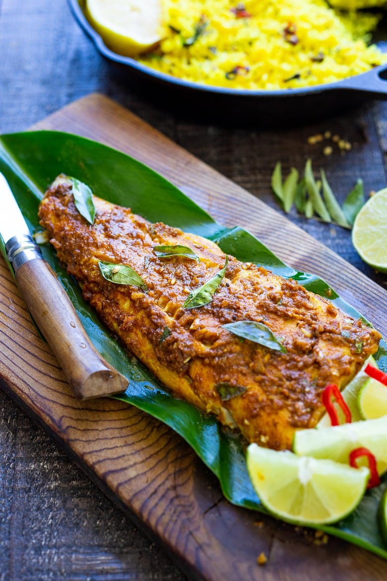 Our 35 BEST Indian Recipes | Here's a simple yet super flavorful recipe for Kerala-Style Fish, made with a flavorful paste that is either grilled or roasted in the oven. Curry leaves and Tamarind give this Indian Recipe its unique flavor. #kerala #keralafish #whitefish #indianrecipes