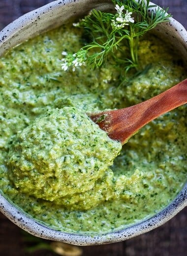 This flavorful Poblano Pumpkin Seed Sauce is made with roasted poblano peppers and pumpkin seeds- a tasty addition to tacos, enchiladas, or burrito bowls! #poblanosalsa #pepitasalsa #poblanosauce #pepitasauce